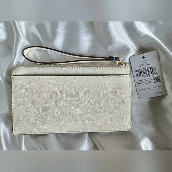 Kate Spade Cream Floral Cutout Wristlet NWT - Picture 2 of 5